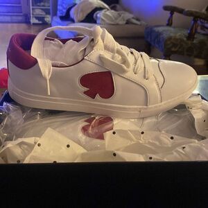 Size 9.5 Kate Spade white leather sneakers brand new in the box never been worn